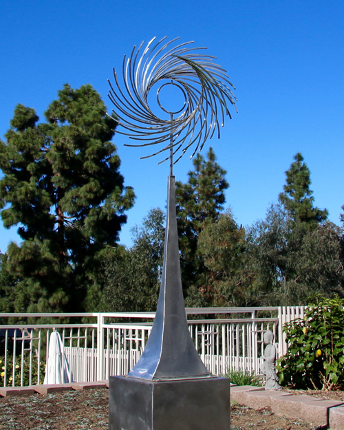 Kinetic sculpture by Amos Robinson "Awakening" contemporary art stainless steel San Diego artist
