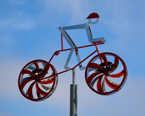 Kinetic bicycle sculpture by Amos Robinson "Redondo Seahawks" contemporary art stainless steel