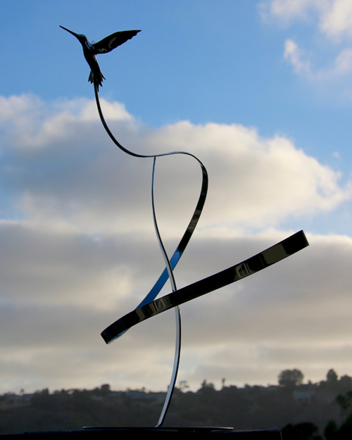 Kinetic art mobile by Amos Robinson hummingbird in flight stainless steel contemporary art