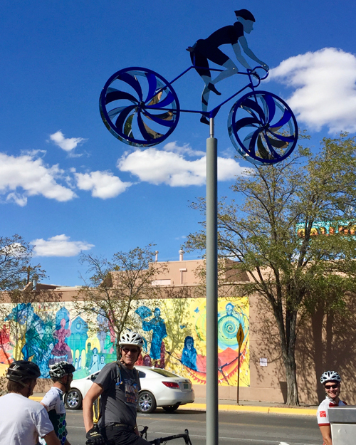 Kinetic bicycle sculpture by Amos Robinson contemporary art stainless steel Gallup New Mexico