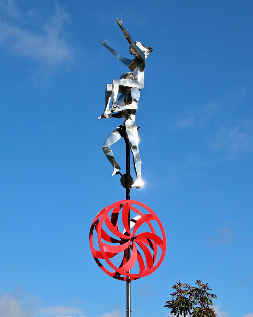 Kinetic art by Amos Robinson Lift Me With Your Love unicycle stainless steel contemporary art