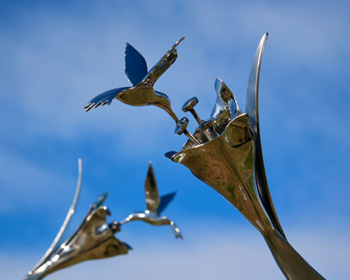 Kinetic sculpture by Amos Robinson Jewels Flying Hummingbirds stainless steel contemporary art