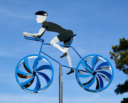 Kinetic bicycle sculpture by Amos Robinson male road racer stainless steel contemporary art
