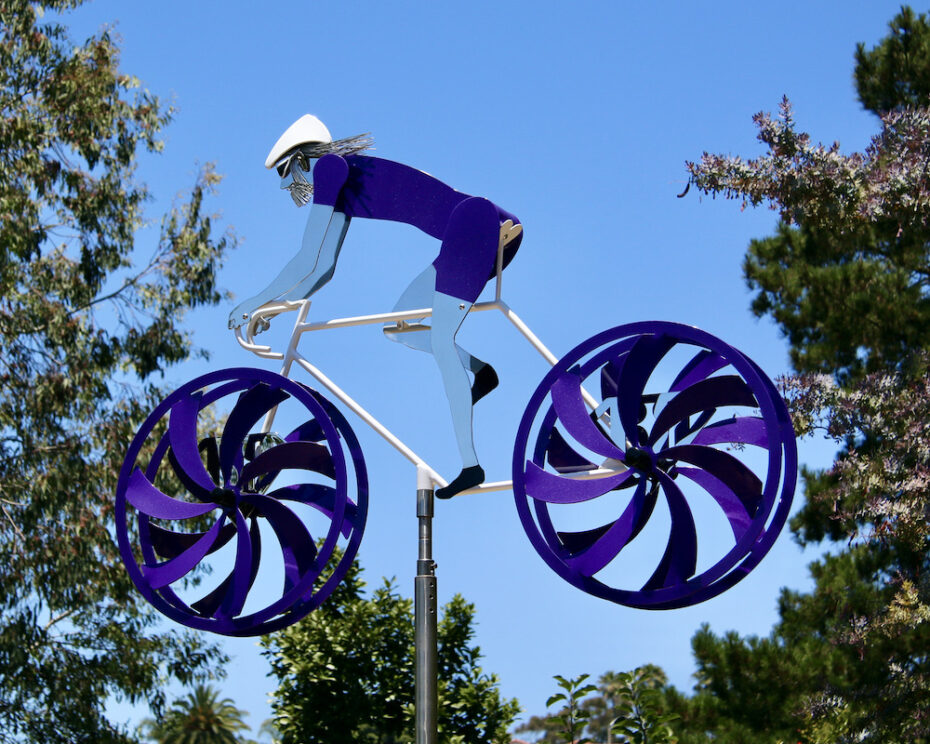 Kinetic bicycle sculpture by Amos Robinson male cyclist road racer stainless steel contemporary art