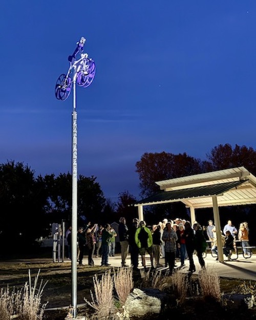 Kinetic bicycle sculpture by Amos Robinson male cyclist road racer stainless steel contemporary art Hutchinson Kansas